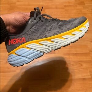 Hoka Gray Sneakers with Red, Yellow, and Light Blue Accents